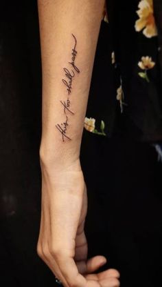 a woman's arm with a tattoo that reads, i love you to the moon and back