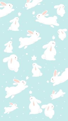 an image of rabbits flying in the air on a blue background with snow flakes