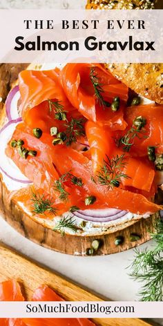 the best ever salmon gravy on a wooden cutting board with fresh herbs and capers