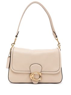 Ivory calf leather Tabby shoulder bag from COACH featuring gold-tone hardware, gold-tone logo plaque, leather tag, foldover top with magnetic fastening and adjustable shoulder strap. Tas Coach, Coach Tabby Shoulder Bag, Tabby Shoulder Bag, Coach Tabby, Handbag Essentials, Girly Bags, Leather Tag, Cute Handbags