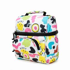 This compact insulated lunch bag has a small footprint, like a mini lunch bag, and is small enough to fit in a child’s backpack or crowded office fridge, yet it’s large enough to hold a medium lunch. This cooler lunch bag for women holds a 12-16 oz drink, a yogurt cup, a fruit cup, a small cottage cheese container, an apple, and 2 frozen gel packs. Your drink bottle secures in the top to keep it from squishing your sandwiches. The front pocket of this small insulated lunch box is perfect for car Functional Multicolor Lunch Box For Travel, Functional Multicolor Lunch Box For Everyday Use, Cute Multicolor Lunch Box For Everyday Use, Functional Multicolor Lunch Bag For Back To School, Functional White Lunch Bag For Travel, Functional White Lunch Bag For Everyday, Functional Multicolor Lunch Bag For Daily Use, Cute White Lunch Bag For Travel, Functional Multicolor Lunch Box For School