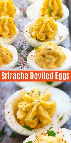 deviled eggs are stuffed with cheese and garnished with herbs for an easy appetizer