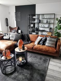 a living room filled with lots of furniture and decor