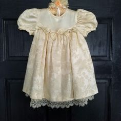 Beautiful Creme Colored Toddler Dress, Perfect For A Church Event Or Wedding Made By Good Lad Of Philadelphia, Manufacturer Of Quality Children's Clothes Most Likely Never Worn, Although It Does Have Two Small Age Stains That May Come Out If Treated Properly (See Pictures) Tag States "Dry Clean Only" Comes With Pictured Decorative Hanger Always Willing To Bundle With My Other Vintage Baby Items, Message Me! Fitted Cream Princess Baptism Dress, Fitted Cream Princess Dress With Lace Trim, Cute Fitted Dress For Baptism, Princess Style Short Sleeve Baptism Dress, Fitted Short Sleeve Princess Dress For Baptism, Cream Short Sleeve Dress For Dress-up, Cute Fitted Dress For First Communion, Cream Fitted Princess Dress For Dress-up, Fitted Cute Baptism Dress