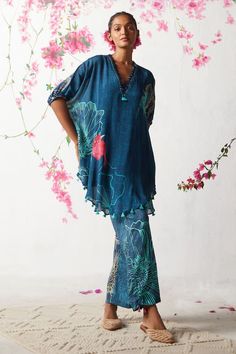 Blue kaftan with floral prints and embellished neckline. Paired with printed pant. - Aza Fashions Unstitched Bohemian Summer Sets, Blue Silk Bohemian Sets, Bohemian Blue Silk Sets, Blue Bohemian Maxi Sets, Bohemian Blue Maxi Length Sets, Blue Bohemian Tunic Set, Blue Bohemian Palazzo Set For Spring, Blue Printed Palazzo Set For Summer, Summer Blue Palazzo Set With Printed Motifs