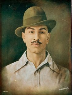 an old photo of a man with a mustache and hat in the middle of his face