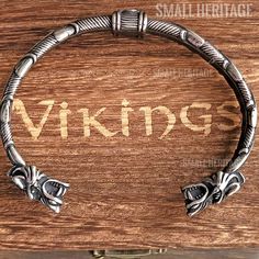 Men Viking Wolf Head Cuff Stainless Steel Norse Bracelet Medieval Celtic Bangle This Viking inspired Arm Ring features Odin’s Wolves Geri and Freki Fast Free Shipping From USA (USPS) Specifications: Metals Type: Stainless Steel Bracelets Type: Cuff Bracelet Fine or Fashion: Fashion Style: Vintage Material: Metal Shape/pattern: Animal Wolf Bracelet length: 8 In / 20 ... Norse Bracelet, Geri And Freki, Wolf Bracelet, Viking Wolf, Arm Ring, Viking Men, Stainless Steel Bracelet Men, Wolf Jewelry, Heritage Jewellery