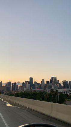 a view of a city from the freeway