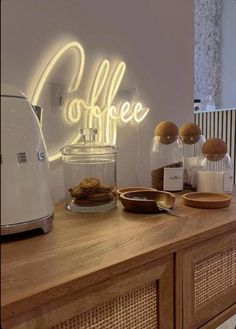 the coffee bar is decorated with lights and cookies