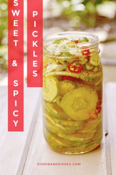 pickles and spices in a jar on a wooden table with the words sweet pickles and spicy