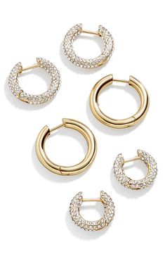 Enjoy three ways to sparkle and shine with this trio of huggie-hoop earrings in gleaming goldtone plating and rows of glistening crystals. Includes three pairs huggie hoop earrings 1/2"-3/8" hoop diameter; 1/8" width Hinges with snap-post closures Goldtone plate/glass/cubic zirconia Imported Preppy Jewelry, 18k Gold Earrings, Jewelry Accessories Ideas, Crystal Hoop Earrings, Jewelry Lookbook, Earrings In Gold, Huggie Hoop Earrings, Girly Jewelry, Jewelry Inspo