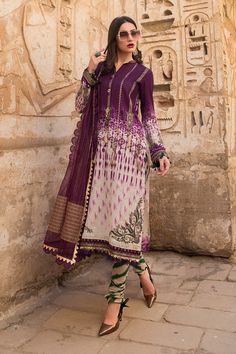 The new party and festive wear collection is all set to grab your attention with designer eid outfits. You can buy lavish fancy wear online to adorn your special event look in an elegant way. Shirt: This lavish festive attire is showing its grace with elegant plum color embroidered panels for shirt. Chiffon shirt is embellished with thread embroidered front and printed back panel. Neck is designed with lawn embroidered neckline. Lawn printed sleeves are designed with embroidered sleeve patti. Sh Eid Outfits Pakistani, Maria B Lawn, डिजाइनर कपड़े, Pakistani Dresses Online, Eid Outfit, Eid Outfits, Lawn Dress, Eid Dresses, Maria B