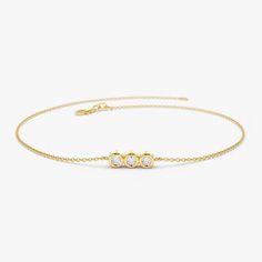 Gold KT: 14K Gem Stone: White Genuine Diamond Round Diamond: 3 pcs 2.0MM Total CTW: 0.10 Diamond Color-Clarity: G Color Si Clarity Setting Type: Bezel A row of three flawless round-cut bezel-set diamonds sits at the center of a dainty 14K gold chain. Diamond Bar Bracelet, Solitaire Bracelet, Bezel Bracelet, Bracelets Gold Diamond, Gold Bracelet For Women, Bezel Set Diamond, Gold Diamond Jewelry, Bar Bracelets, Lovely Jewellery