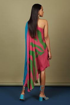 Hot pink and blue one-shoulder draped dress with uneven hem, knotted shoulder and green abstract pattern print.
Component: 1
Printed
Neckline: Asymmetric
Sleeve Length: Sleeveless
Fabric: Natural Crepe
Color: Blue, Pink
One shoulder
Asymmetric hem - Aza Fashions Pink Draped One Shoulder Summer Dress, Multicolor Midi Dress With Asymmetrical Neckline For Summer, Multicolor Asymmetrical Dress With Neckline For Summer, Multicolor Asymmetrical Dress For Summer, Multicolor Asymmetrical Dress With Asymmetrical Neckline For Summer, Green Draped Asymmetrical Dress, Pink One Shoulder Asymmetrical Summer Dress, Pink Asymmetrical One-shoulder Summer Dress, Sleeveless Multicolor Asymmetrical Dress