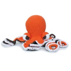 an orange and white crocheted octopus toy