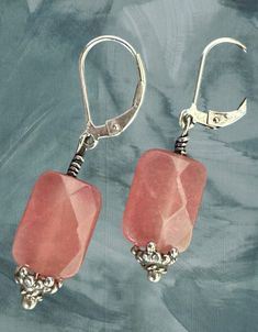 Perfect for adding a pop of color to any outfit, these strawberry Jade earrings are a beautiful and unique addition to your jewelry collection. The Bali silver accents add a touch of elegance and sophistication, while the silver lever backs ensure a secure and comfortable fit. With a hang of 1 inch, these earrings are the perfect length for everyday wear or special occasions. Treat yourself or someone special to these stunning earrings today! Classic Pink Dangle Earrings, Classic Pink Dangle Jewelry, Adjustable Lever Back Jewelry Gift, Adjustable Lever Back Jewelry As A Gift, Elegant Adjustable Lever Back Jewelry, Pink Nickel-free Clip-on Earrings As Gift, Classic Pink Sterling Silver Earrings, Pink Everyday Jewelry With Ear Wire, Nickel-free Pink Earrings For Everyday