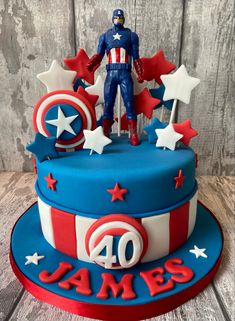 a captain america themed birthday cake with stars and the number 40 on it's side