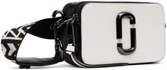 Saffiano leather shoulder bag in black and white. · Adjustable and detachable logo-woven crossbody strap · Logo embossed at top · Logo hardware at face · Patch pocket at back face · Twin zip closures · Patch pocket at two-compartment interior · Faille lining · Logo-engraved silver-tone hardware · H4 x W7 x D2.25 Supplier color: Black/White Marc Jacobs Snapshot Bag New Black Multi, Marc Jabos Snapshot Bag, Silver Marc Jacobs Bag, Marc Jacobs Side Bag, Marc Jacobs Crossbody Bag Black, Face Patches, Jacob Black, Marc Jacobs Bag, Silver Engraving