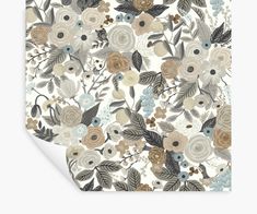 a floral wallpaper with brown, blue and white flowers on it's sides