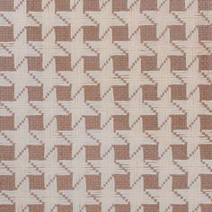 a brown and white checkered pattern on fabric