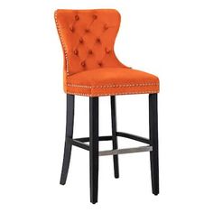 an orange upholstered bar stool with buttons