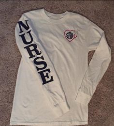 a white long sleeve shirt with the words nurse on it