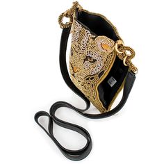 Let your fashion spirit roar with this leopard crossbody phone bag that is perfectly sized to fit all your essentials when you're out on the prowl. 4.75 x 0.5 x 7.75" Strap Length End to End: 49" Strap Drop: 24.25" Non-removable leather crossbody strap Top compartment Side zipper compartment Fits a phone Includes metal logo fob This is a handmade item, each one an individual work of art. Slight variations may occur. Learn More about our Global Impact Mary Frances Handbags, Novelty Handbags, Black Opaque Tights, Crossbody Phone Bag, Novelty Purses, Big Handbags, Mary Frances, Top Handle Handbags, Novelty Bags