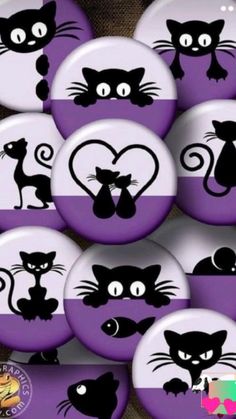 purple and white buttons with black cats on them