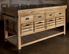 a large wooden table with drawers on it