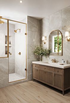 a bathroom with marble walls and wooden floors