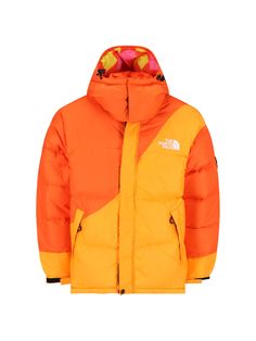 The North Face X Yinka Ilori two-tone down jacket in orange and yellow nylon with removable drawstring hood, Velcro and zip closure, logo embroidery on the chest, two side zip pockets, button on the bottom, black logo patch on the sleeve, elastic cuffs, white logo embroidery on the back, multicolor geometric pattern inside, inner zip pocket, white logo label inside, elastic hem. Composition: 100% Nylon The North Face Nylon Puffer Jacket With Detachable Hood, The North Face Nylon Puffer Jacket With Pockets, The North Face Nylon Outerwear With Detachable Hood, The North Face Streetwear Puffer Jacket With Detachable Hood, The North Face Hooded Nylon Puffer Jacket, Orange Nylon Outerwear For Outdoor Activities, Functional Orange Nylon Outerwear, Functional Orange Hooded Outerwear, Sporty Orange Nylon Outerwear