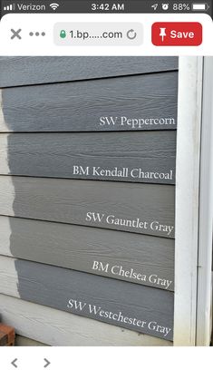 the side of a house that has been painted gray