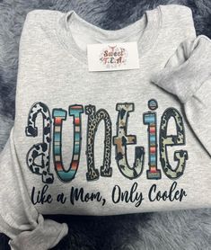 Auntie Western Sweatshirt - like a mom, only cooler Gildan brand - 50% cotton, 50% polyester Unisex fit, Size up for an oversized look. Western Sweatshirts, Like A Mom, Oversized Look, Sweat Shirt, Favorite Outfit, Gender Neutral, Bathing Beauties, Adult Outfits, Sweatshirts Hoodie