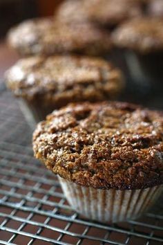 several muffins cooling on a wire rack