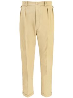 Our Edwin trousers are a tribute to vintage style. These authentic reproduction chino trousers share all the features of the true vintage late 40s pair of pants taken from our archive collection, making them the ideal choice for summertime Nostalgia events and day trips alike. Our Edwins sit high on the waist compared to a modern pair of fashion trousers. The button fly fastening mirrors the style of pants from the 1940s and 1950s decades. They benefit from both buttons for attaching trouser bra Classic Tapered Pants With Belt Loops, Classic High-waisted Cotton Chinos, Vintage Tailored Tapered Leg Bottoms, Vintage Tailored Bottoms With Tapered Leg, Vintage Tapered Leg Dress Pants For Workwear, Vintage Dress Pants With Tapered Leg, Vintage Dress Pants With Tapered Leg And Belt Loops, Vintage Tapered Leg Dress Pants With Belt Loops, Retro Beige Workwear Pants