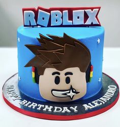 a birthday cake for roblox is decorated with a lego head