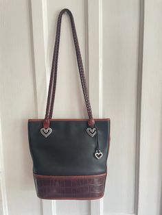 "Brighton two tone black brown tote bag  9\" long bottom 12 1/4\" long on top 10 1/2\" h  3 3/4\"d 14 3/4\" handle drop magnet closure inside one internal zip pocket creed inside says no.769214 black fabric lining braided brown leather handles" Medium Black Satchel For Everyday Use, Brown Medium Bag For Errands, Black Medium Bags With Handles, Medium Black Shoulder Bag With Handles, Brown Tote Bag, Brown Tote, Leather Hobo Bag, Travel Wallets, Leather Handles