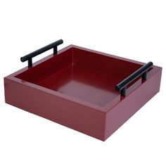 a red tray with black handles on it