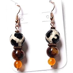 J101 Handmade Beaded Brass, Carnelian, And Animal Print Dangle Earrings This Is A Listing For A Live Show. Please Watch The Live Show For More Information. Brown Earrings With Natural Stones And Round Beads, Brown Dangle Jewelry With Black Beads, Brass Earrings Handmade, African Accessories, Brass Earrings, Beaded Earrings, Animal Print, Black And Brown, Dangle Earrings