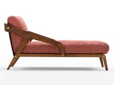 a red couch with wooden legs and arms