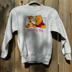 New Without Tags, Disney Winnie The Pooh And Tigger Vintage Pullover Sweatshirt. Features Tigger And Pooh On The Front And Back As Pictured. Pit To Pit 17 1/2” Shoulder To Bottom Hem 21” Winnie The Pooh Shirts, Pooh Shirts, Winnie The Pooh And Tigger, Pooh And Tigger, Winnie The Pooh Shirt, Vintage Pullover, Vintage Winnie The Pooh, Vintage Pullovers, Disney Winnie The Pooh