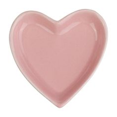 a pink heart shaped dish on a white background