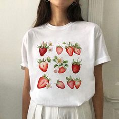 Strawberry T-shirt | Vintage Fruit T-shirt |  Fruit Graphic Y2k 2000's Tee | 90s Style Clothing Foodie Gift Aesthetic Fruit T-Shirt DETAILS ✱ True to size fit with a classic crew neck ✱ Crafted from super soft, 100% cotton fabric for ultimate comfort. ✱ Enjoy FREE worldwide shipping on orders over $75 ✱ Our tees are printed to order & shipped locally, so say goodbye to customs fees - 90% of orders have no customs fees 🚚 FAST SHIPPING Once your order is placed, we gonna work on it within the same hour. PLEASE MAKE SURE YOU ENTER THE RIGHT ADDRESS.  ✨ SPEEDY REPLIES Due to the nature of the product, we don't accept returns due to sizing issues. Please feel free to reach out to us if you have concerns about product faults or other issues. Strawberry T Shirt, Fruit Graphic, Aesthetic Fruit, Fruit Shirt, Graphic Y2k, Gift Aesthetic, Vintage Strawberry, Shirt Aesthetic, Vintage Fruit