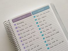 a spiral notebook with the list on it