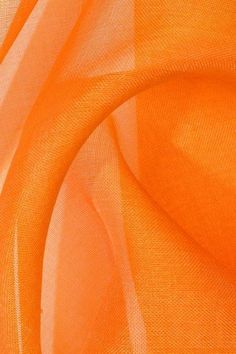 an orange fabric is shown in close up