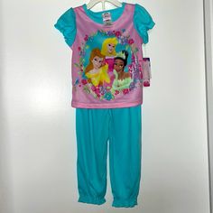 100% Brand New And Authentic Disney Princesses Toddler Girls 2 Piece Short Sleeve Teal Pajama Set Size 3t 100% Polyester Material Flame Resistant Disney Character Print Playwear Sets, Disney Character Print Sleepover Set, Disney Character Print Sets For Sleepover, Disney Cartoon Print Sleepover Sets, Disney Cartoon Print Sets For Sleepover, Disney Character Print Pajama Party Sets, Disney Character Print Sets For Pajama Party, Holiday Onesies, Disney Princess Toddler