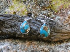 These are a beautiful Handcrafted STERLING SILVER Gemstone pair of earrings.  They are on Sterling Silver french wire hooks and are a nice weight for all day wear. They are made with Blue Copper Turquoise and set in sterling silver.  These two colors together are very eye catching and unique. Copper Turquoise is normal Turquoise that has been crumbled and reformed to add copper to it, in order to create the beautiful effect of the stone. Individual who will wear it will get the benefit of both c Nickel-free Southwestern Teardrop Earrings For Gifts, Southwestern Turquoise Teardrop Earrings For Gift, Copper Turquoise, Bleu Turquoise, French Wire, Handcrafted Earrings, Turquoise Gemstone, Tear Drop, Sterling Silber