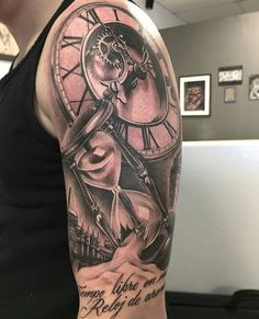 a man with a clock tattoo on his arm