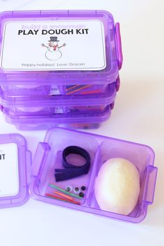 the play dough kit is in its plastic container