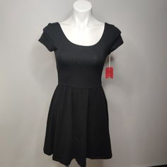 Mossimo Black Dress Short Sleeves Pull On New With Tags Size Small Approximate Measurements When Laid Flat Chest - 14" Waist - 13" Length - 32" Black Stretch Mini Dress Casual, Casual Solid Color Dresses For Night Out, Casual Dresses For A Night Out, Casual Scoop Neck Mini Dress For Night Out, Casual A-line Mini Dress For Night Out, Casual Scoop Neck Dress For Date Night, Casual Scoop Neck Party Dress, Black Scoop Neck Spring Dresses, Black Scoop Neck Dress For Spring